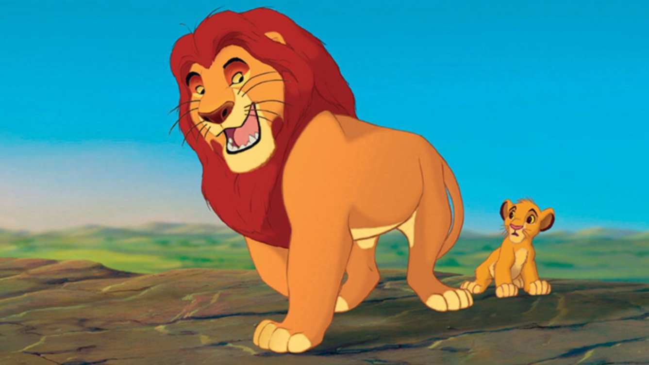 Mufasa and his son, Simba standing on a cliff in 'The Lion King'
