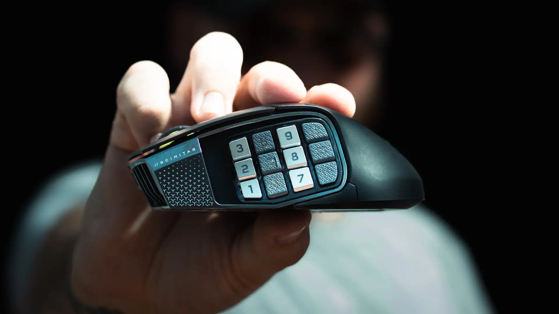 A side shot of the Corsair Scimitar Elite Wireless SE showcasing all 12 programmable buttons