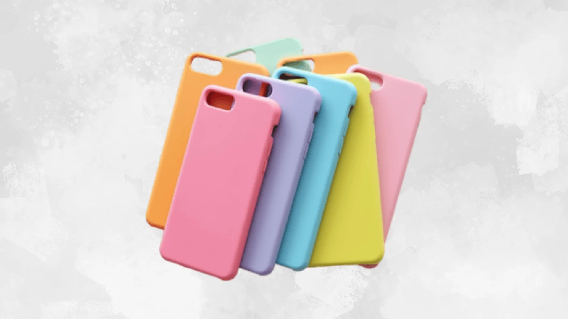 A fan of colourful silicone iPhone cases in pink, orange, purple, blue, yellow, and mint green against a light grey background.